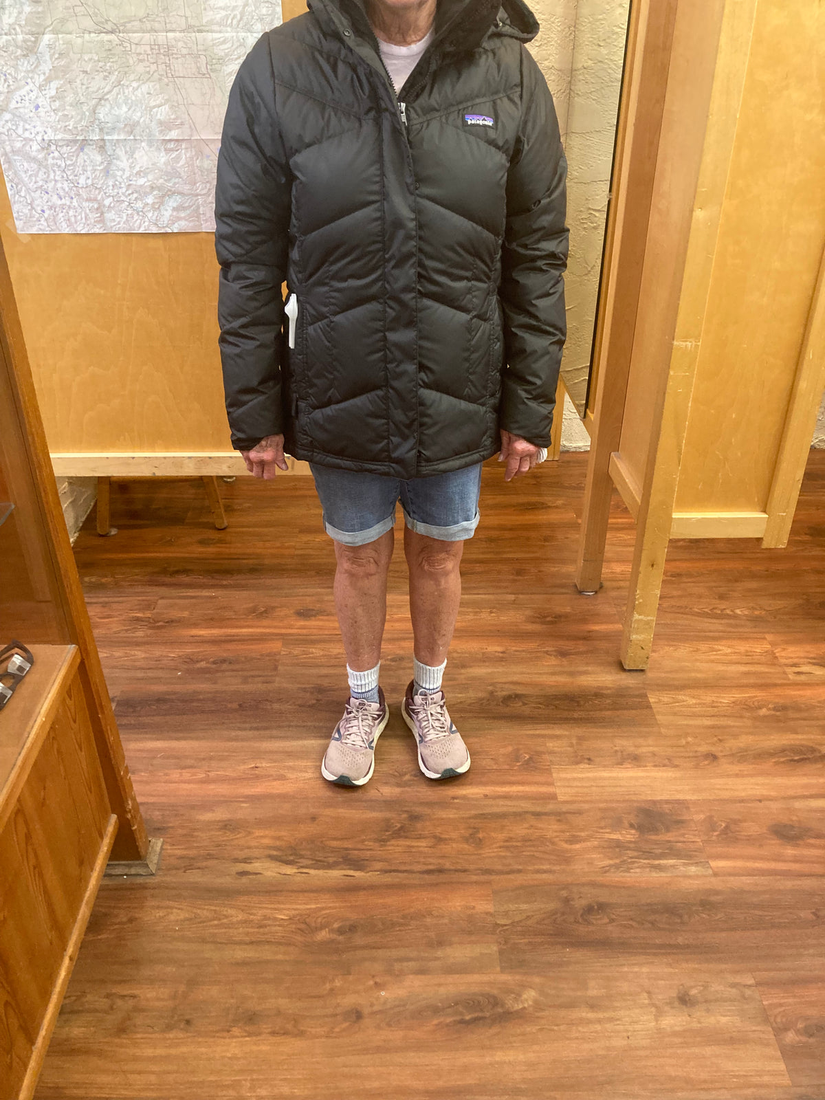 a woman wearing the patagonia down with it parka