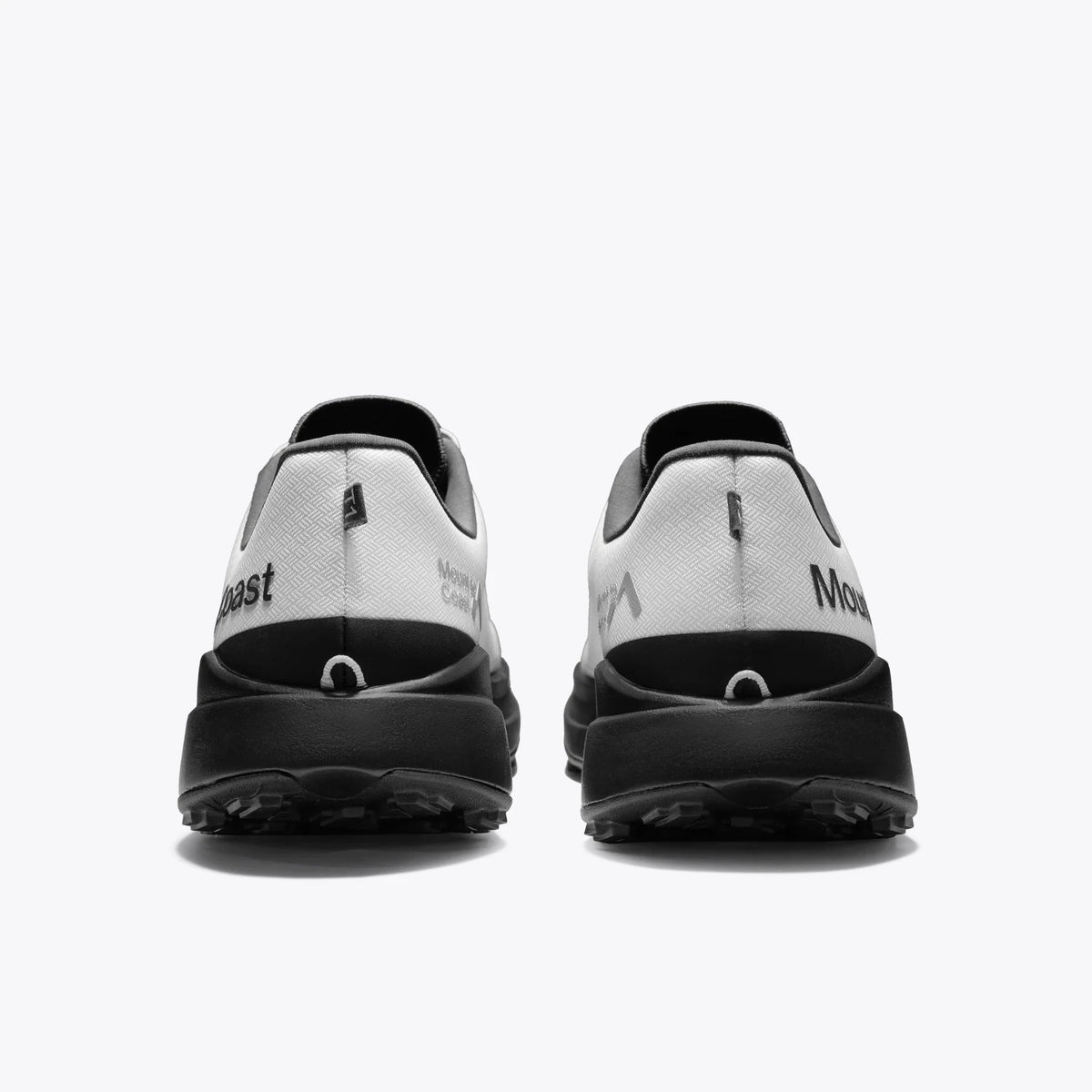 Pair of black and white shoes on a white background