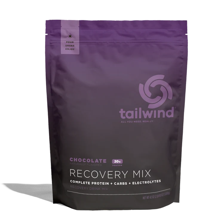 Tailwind Recovery Mix Chocolate flavor in a 42 oz purple resealable stand-up pouch on a white background with a soft shadow.