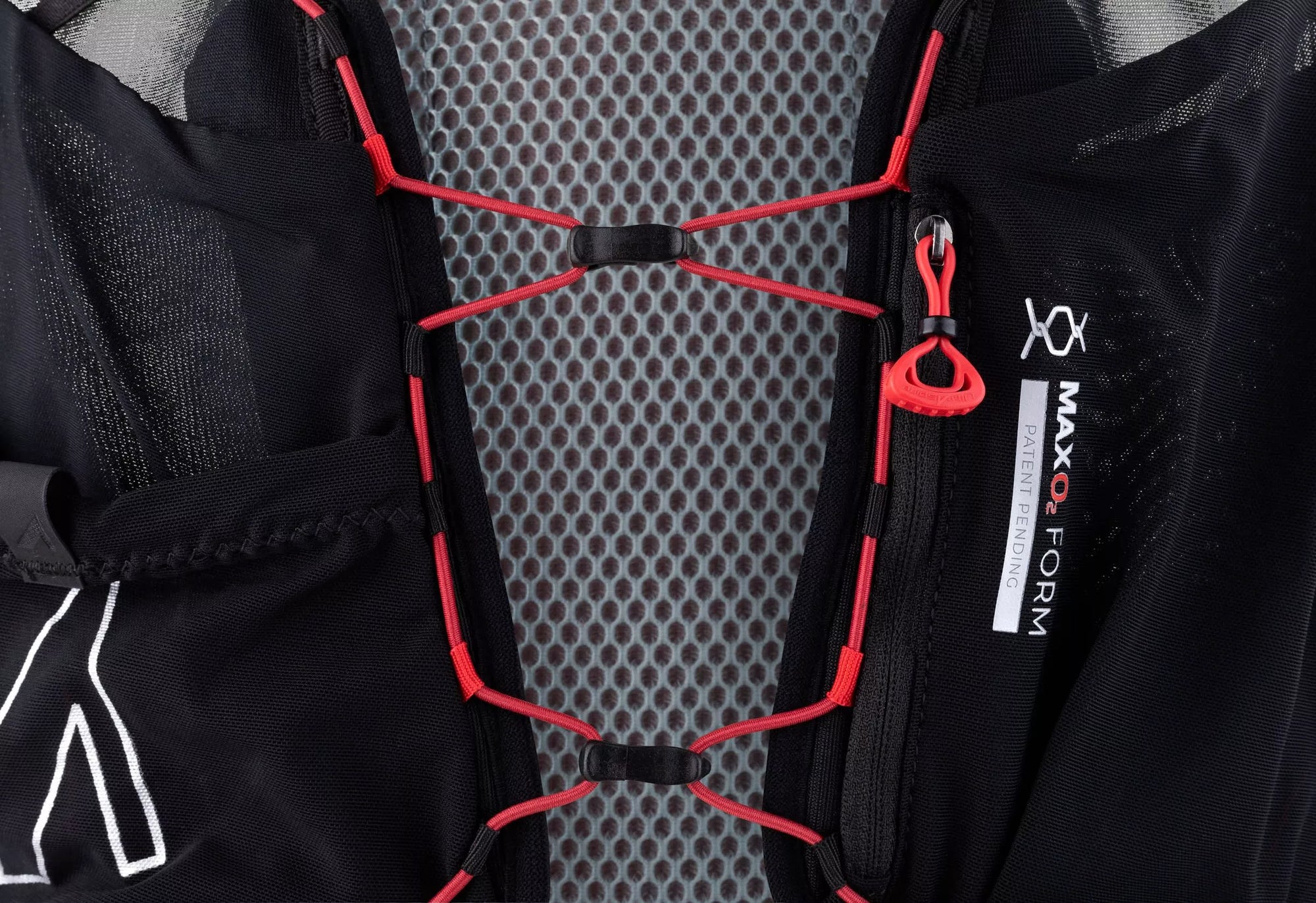 the ultraspire zygos 5 hydration vest showing front attachement system