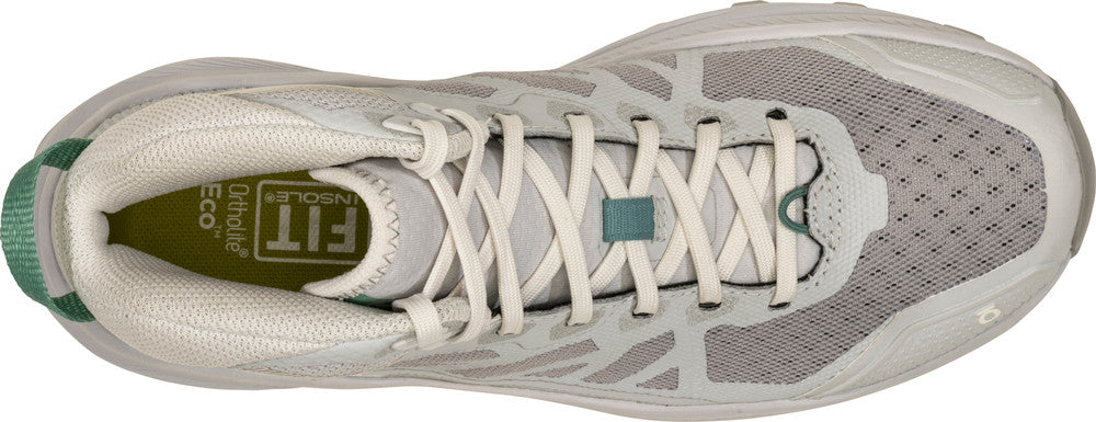 White athletic shoe with gray sole on a white background