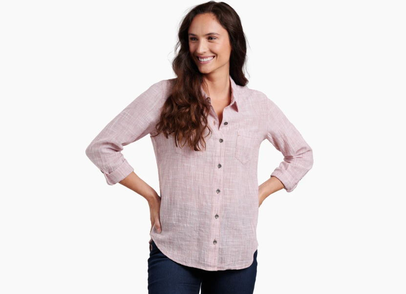 a model wearing the kuhl womens adele long sleeve shirt in the color arabesque, front view
