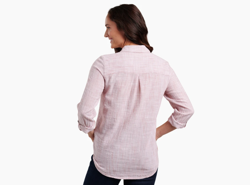 a model wearing the kuhl womens adele long sleeve shirt in the color arabesque, back view
