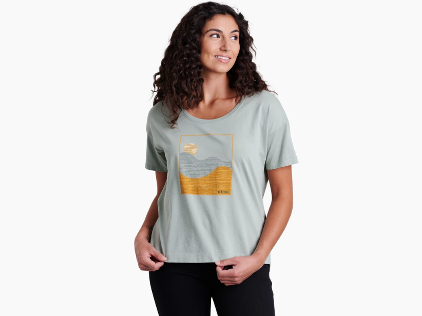 The kuhl womens waves short sleeve tee shirt on a model in the color agave, front view