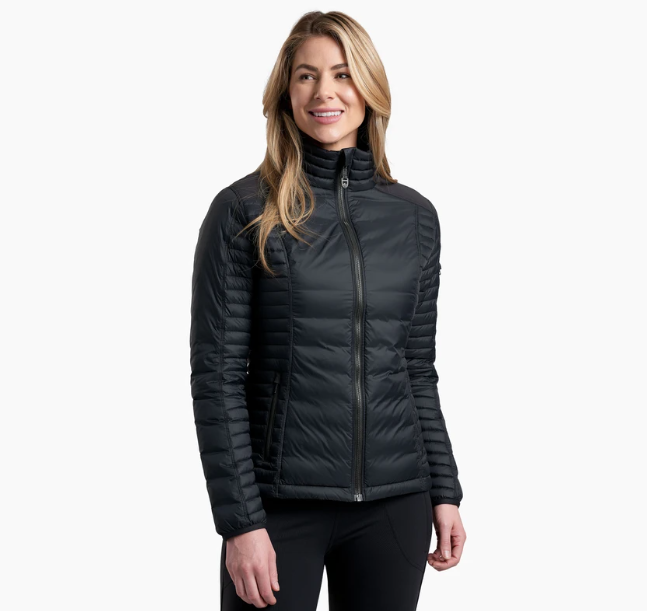 a model wearing the kuhl womens spyfire jacket in the color blackout, front view