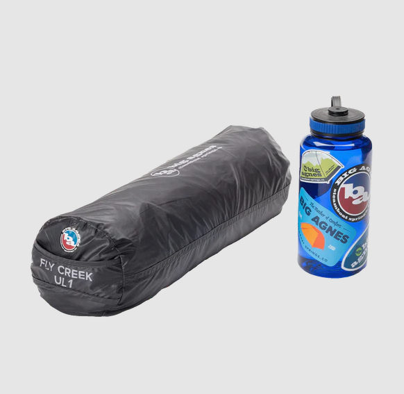 big agnes fly creek ultralight 1 in stuff sack next to water bottle