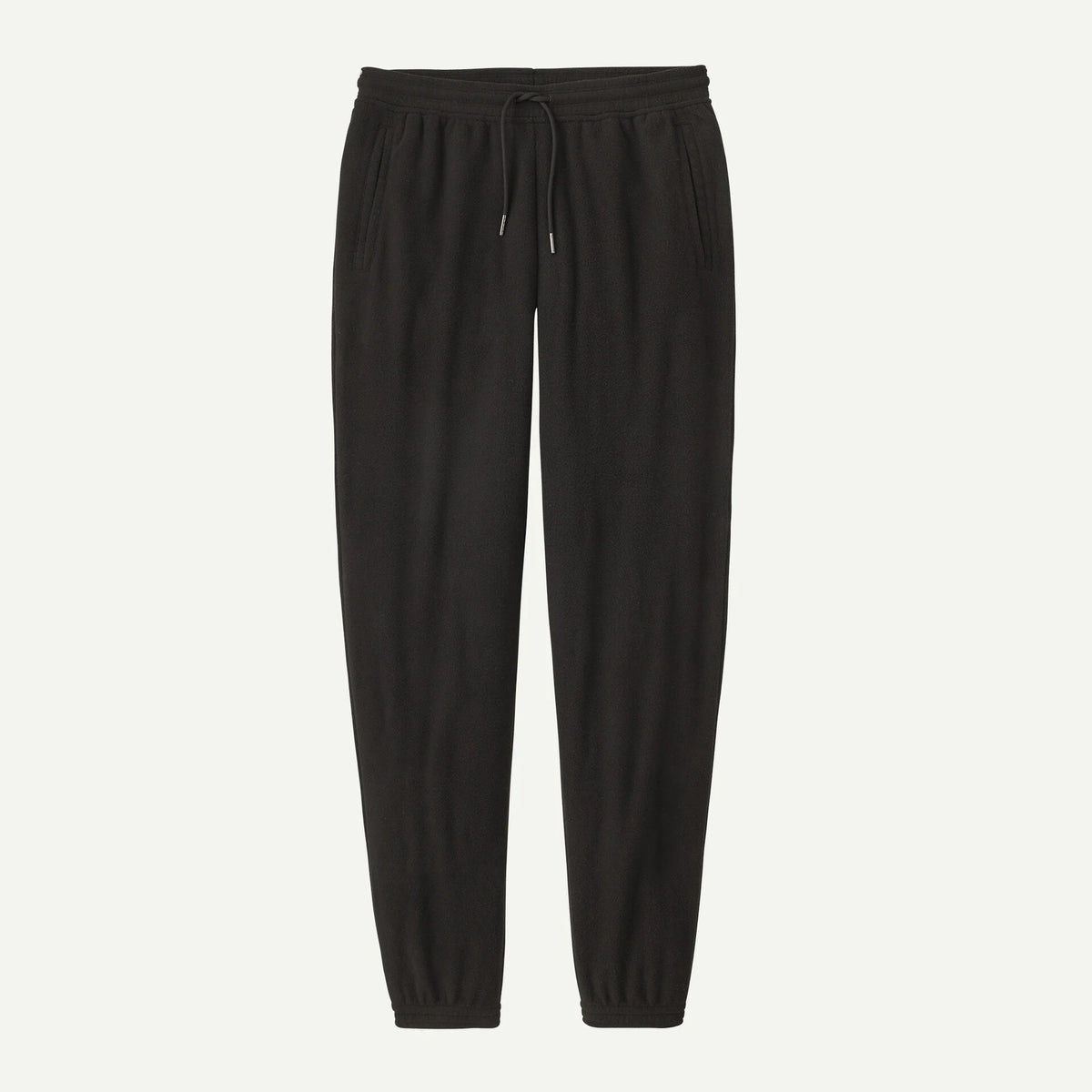 Black jogger pants with an elastic waistband, drawstring, and tapered legs, shown flat against a light off-white background.