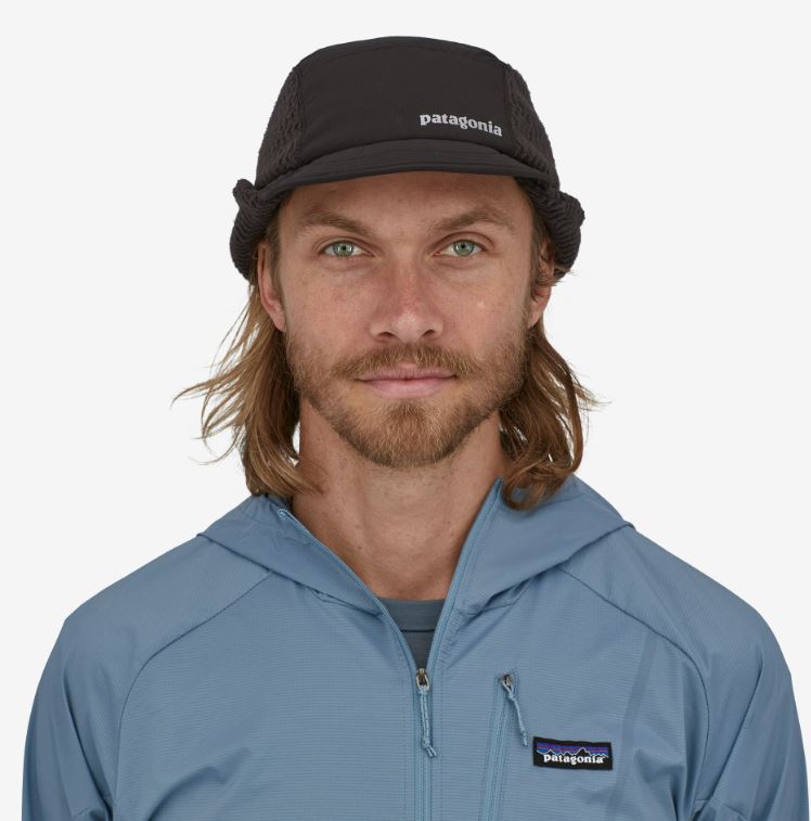 photo of the patagonia winter duckbill running cap in the color black, front view on a model