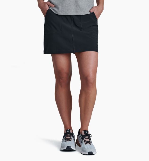 a model wearing the kuhl womens vantage skort in the color black, front view