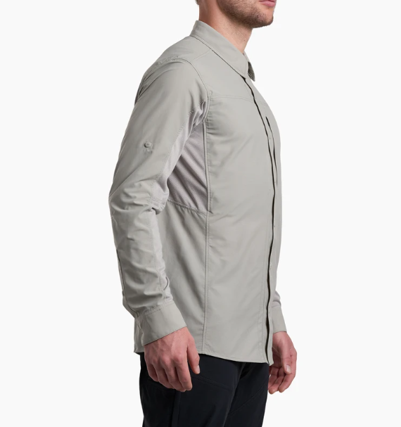 a model wearing the kuhl airspeed long sleeve mens shirt in the color cloud grey, side view