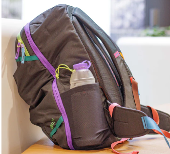 cnoc vesica 42mm 1l bottle shown in a backpack