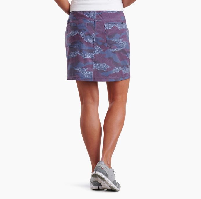 a model wearing the kuhl womens vantage skort in the color twilight print, back view