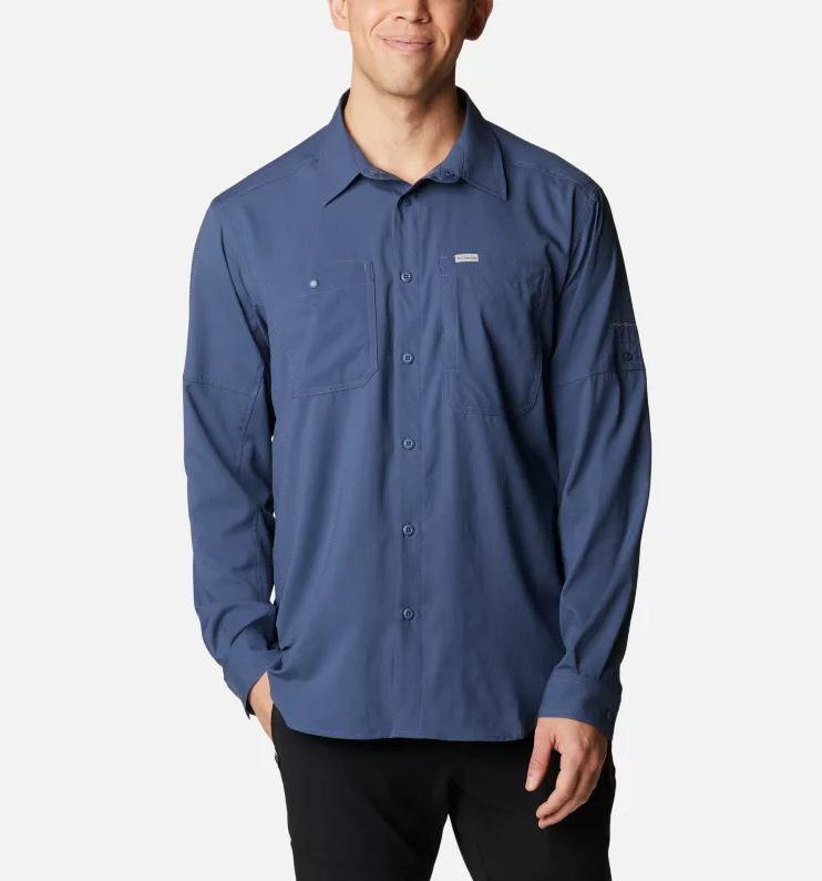 a model wearing the columbia mens silver ridge lite long sleeve shirt in the color dark mountain, front viw