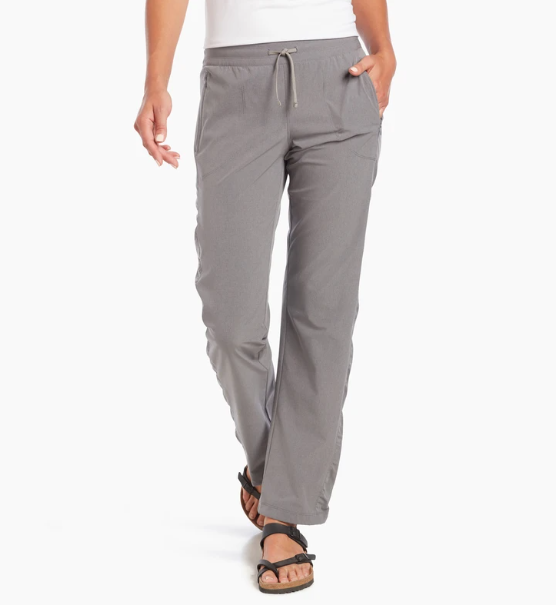 a model wearing the kuhl freeflex move pant in the color flint, front view