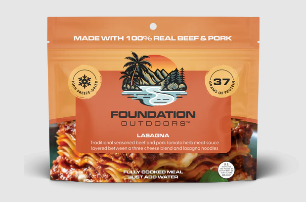 Foundation Outdoors lasagna package with beef and pork ingredients on an orange background
