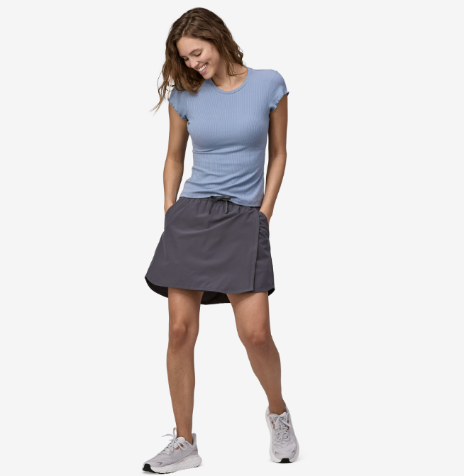 the patagonia womens fleetwith skort in the color smolder blue, front view on a model