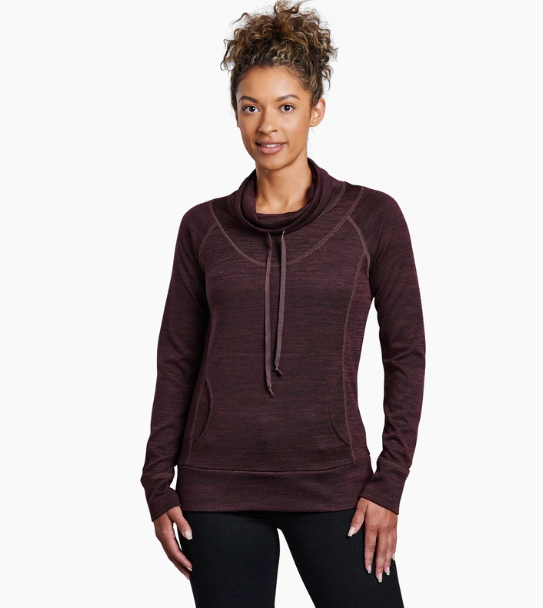 a model wearing the kuhl lea pullover in ganache, front view