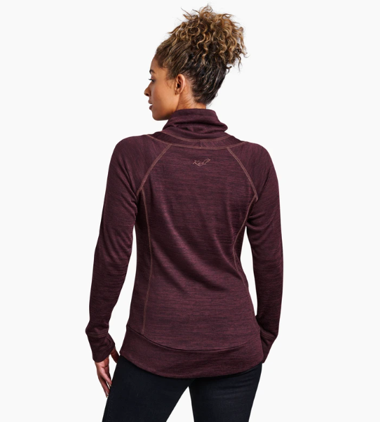 a model wearing the kuhl lea pullover in ganache, back view