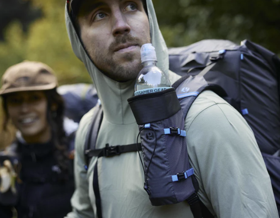 gossamer gear bottle rocket being used by a model