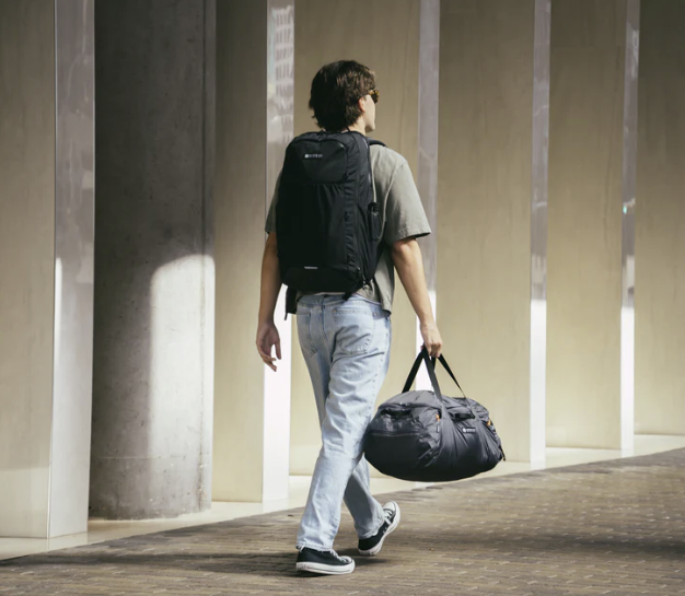 gossamer vanish duffel being carried by some dude