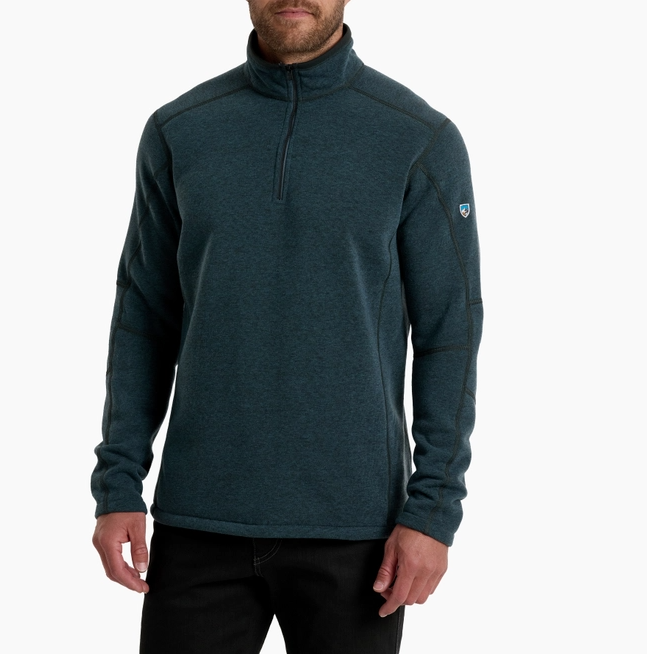 kuhl revel quarter zip in storm blue on a model front view