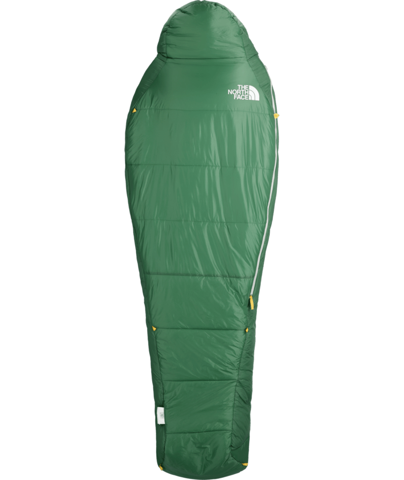 A green mummy-style sleeping bag with a hood, shown from the back on a plain white background. The brand 'The North Face' is printed in white on the upper back, and there are small yellow accents along the zipper and stitching.