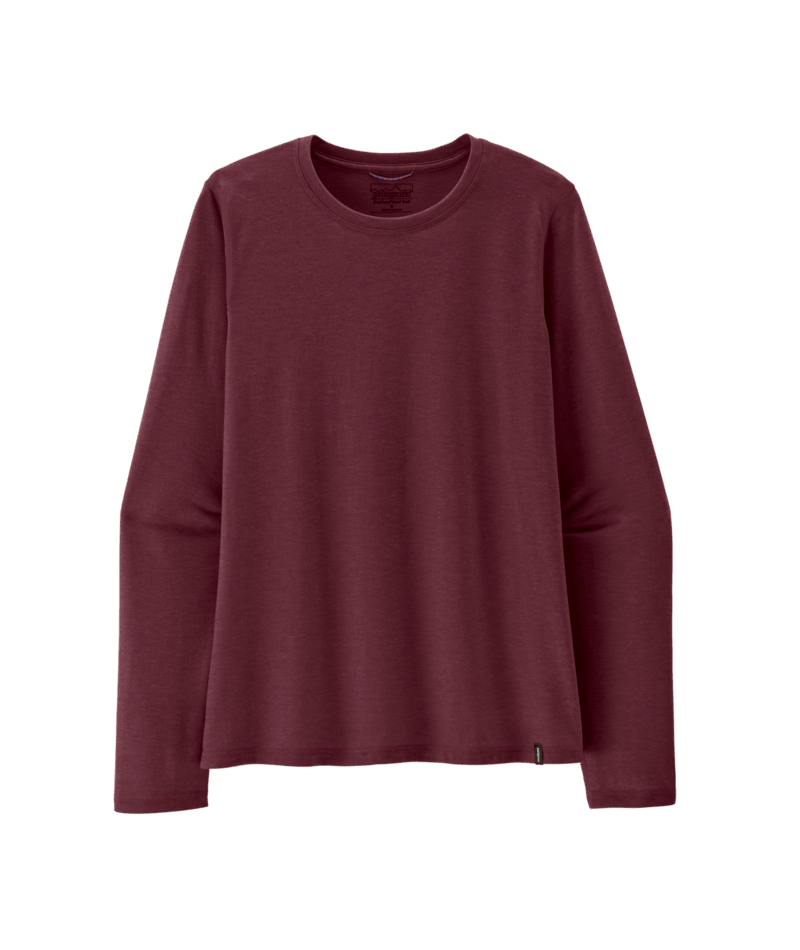 A long-sleeve crewneck shirt in a deep burgundy or maroon color, displayed against a solid dark green background.