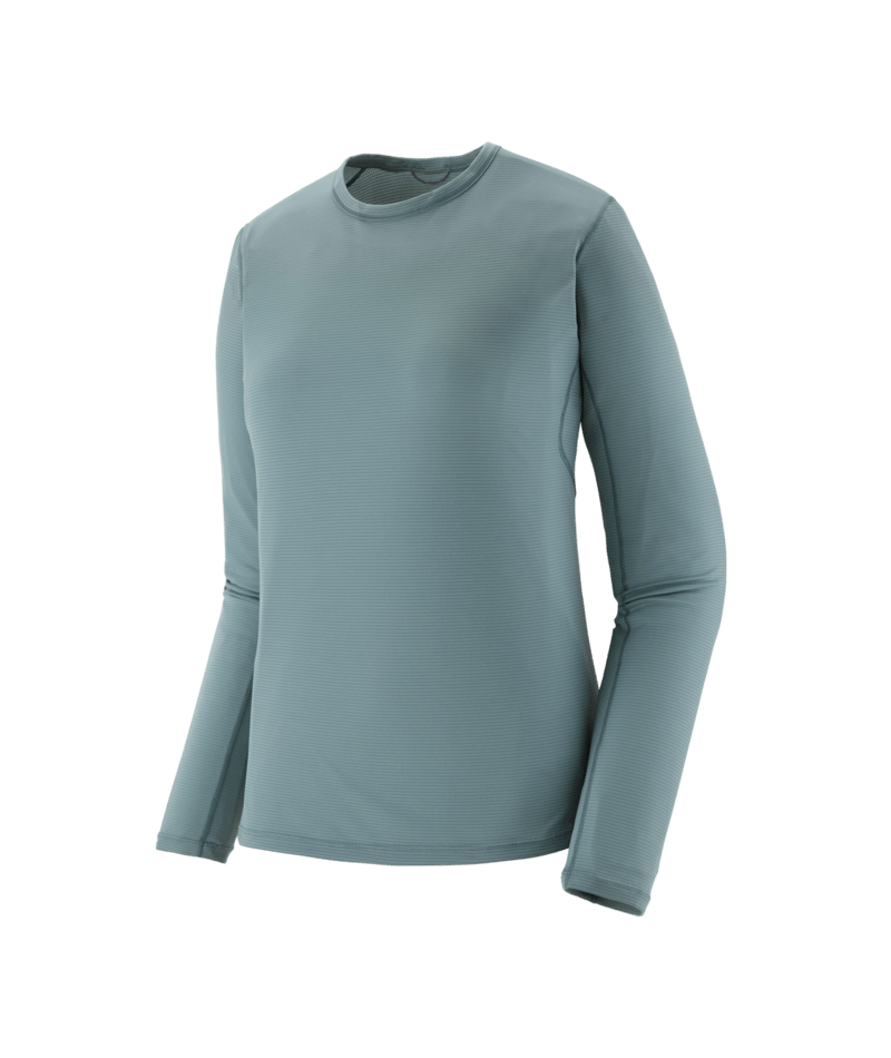 A women's long-sleeve crewneck athletic shirt in a muted sage green color