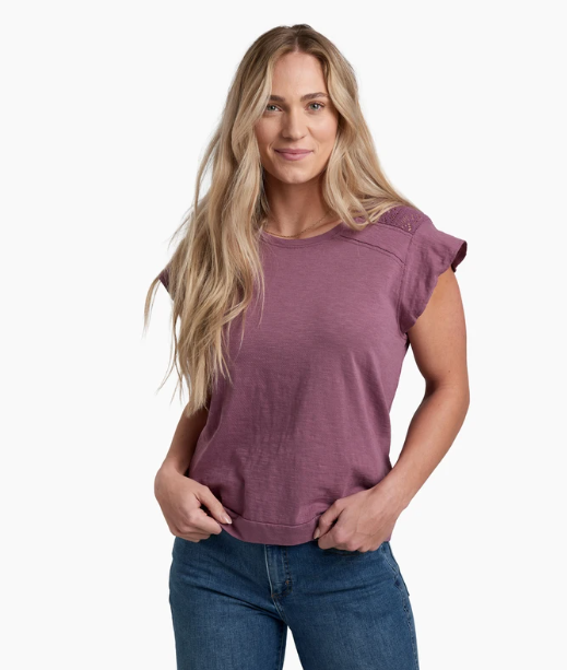 a model wearing the kuhl womens shilo shirt in the color mauve, front view