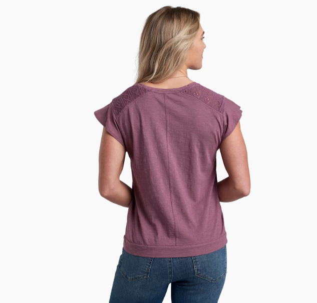 a model wearing the kuhl womens shilo shirt in the color mauve, back view
