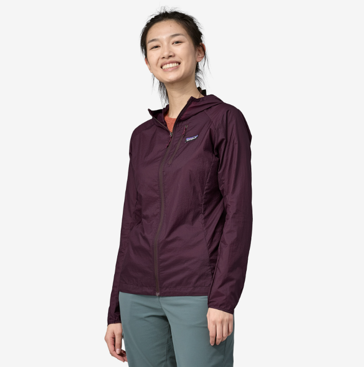 patagonia womens houdini jacket in the color night plum, front view on a model
