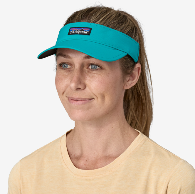 the patagonia airshed visor in the color subtidal blue, front view on a model