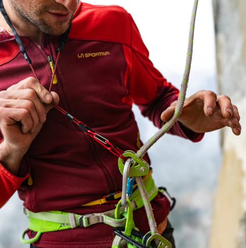 the avant neck lanyard being used by a climber