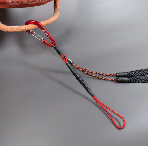 the avant neck lanyard shown clipped to a harness