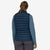 patagonia womens down sweater vest in the color new navy, back view on a model
