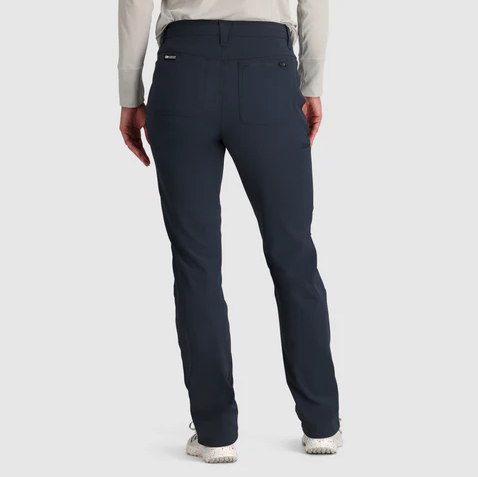 the outdoor research womens ferrosi pants in navy, back view on a model
