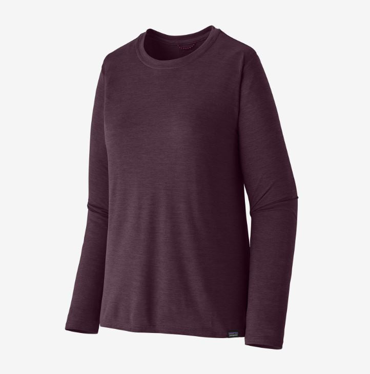 the patagonia womens long sleeve capilene cool daily shirt, front view in the color night plum 