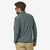 the patagonia r1 air zip neck mens jacket in the color nouveau green, back view on a model