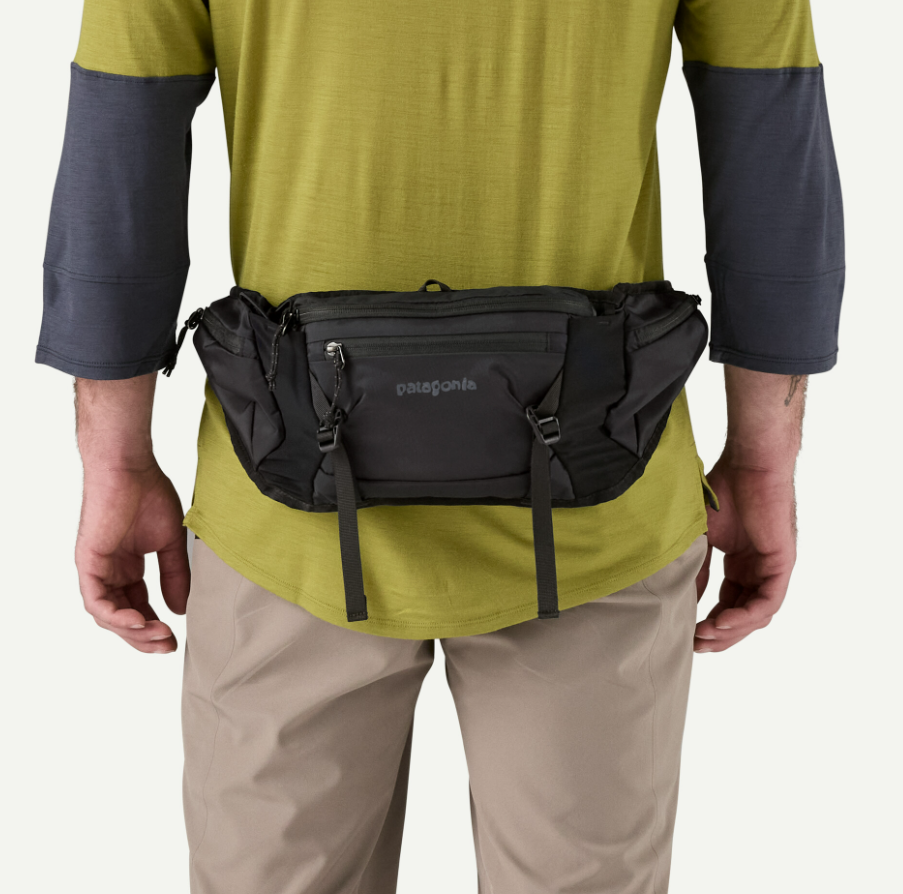 patagonia dirt roamer pack in black on a model
