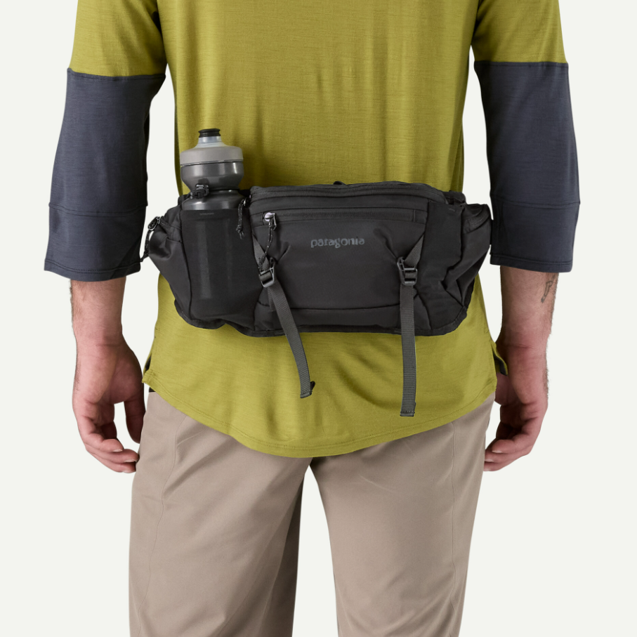 patagonia dirt roamer pack in black on a model