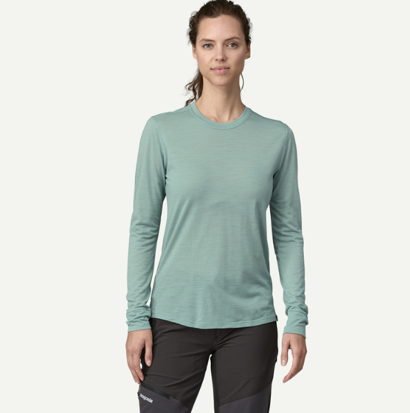 patagonia womens capilene cool long sleeve shirt merino blend in thermal blue, front view on a model