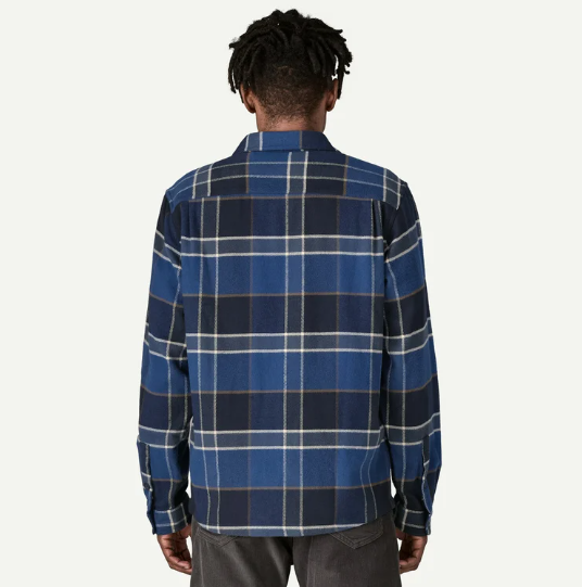 patagonia mens fjord flannel in sunken blue on a model back view