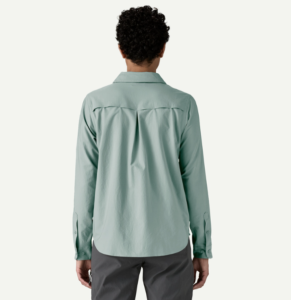 patagonia womens self guided hike shirt in thermal blue back view on a model