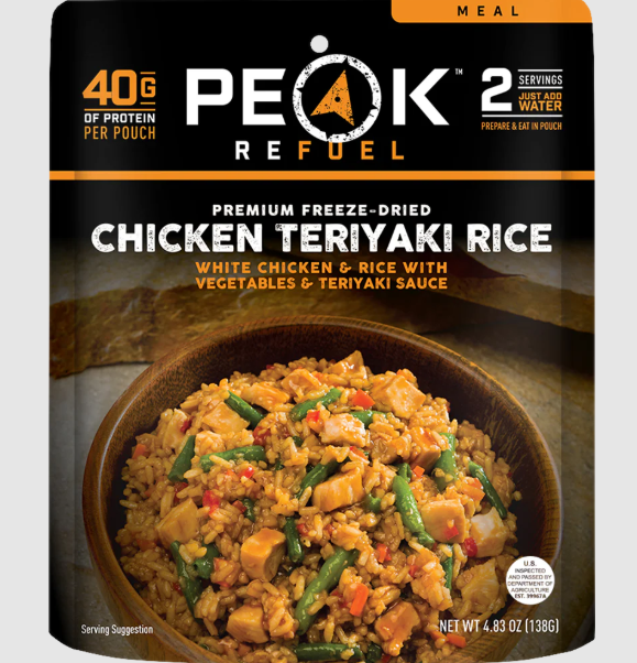 Peak Refuel Chicken Teriyaki Rice package with a bowl of rice and chicken on a gray background