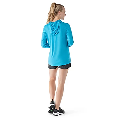 smartwool active ultralight hoody on a model in color pool blue, back view