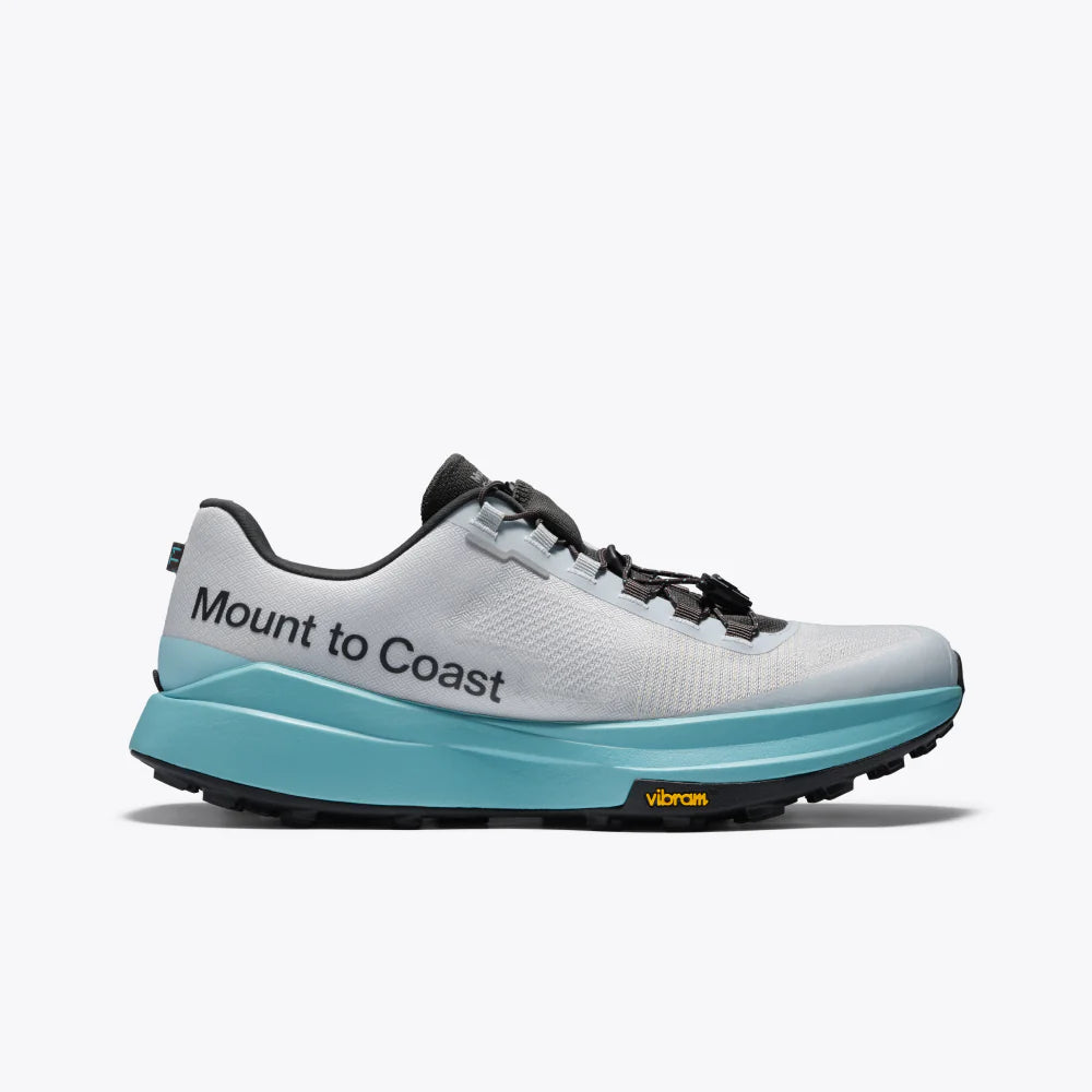 White and blue running shoe with 'Mount to Coast' branding on a white background