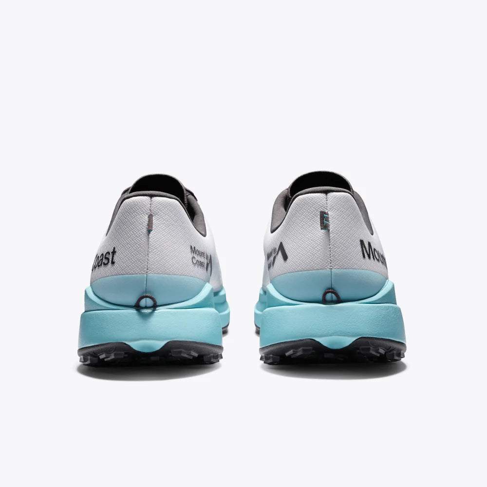 Pair of gray and light blue athletic shoes with 'Mega' branding on a white background