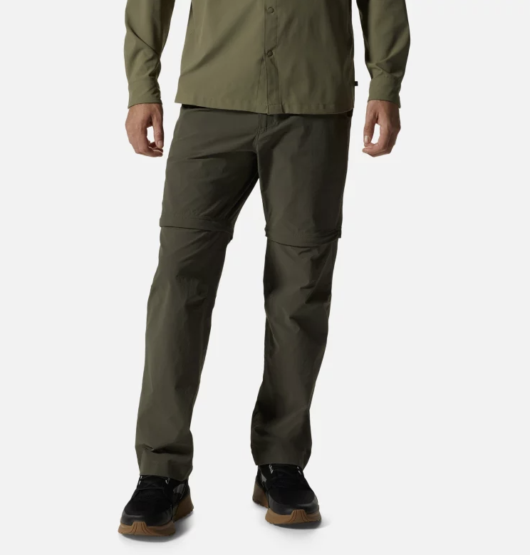a model wearing the mountain hardwear basin convertible pants men in the color ridgeline, front view
