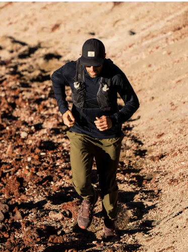 ridge merino mens pursuit hoody in black on a model running