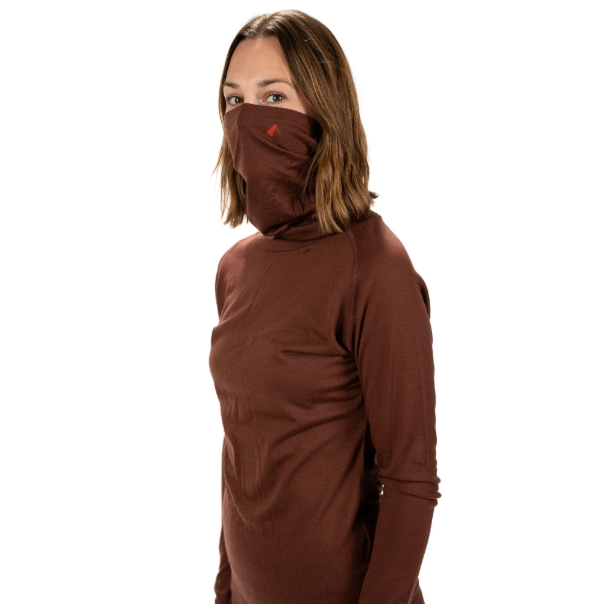 ridge merino womens aspect high neck top in color rum on a model